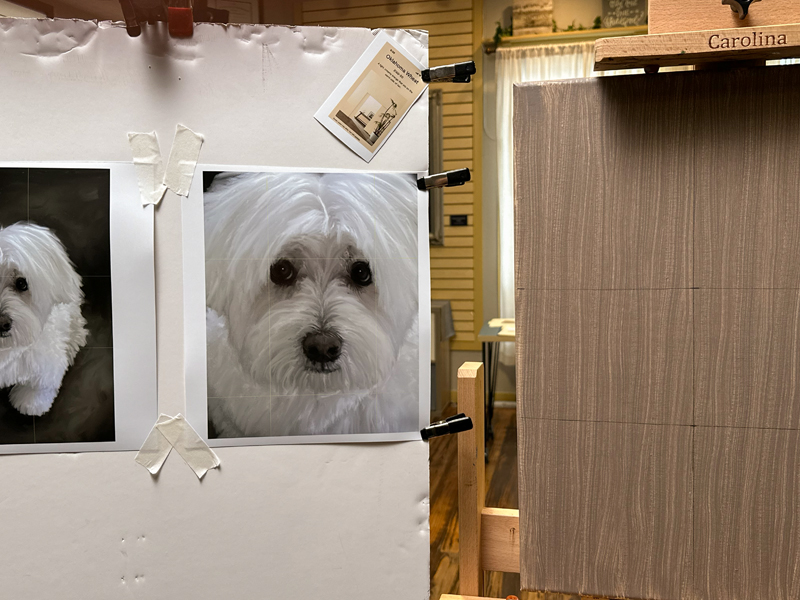 Framed oil portrait of Frankie, a small white dog with expressive dark eyes, painted as a memorial pet portrait on a soft neutral background.