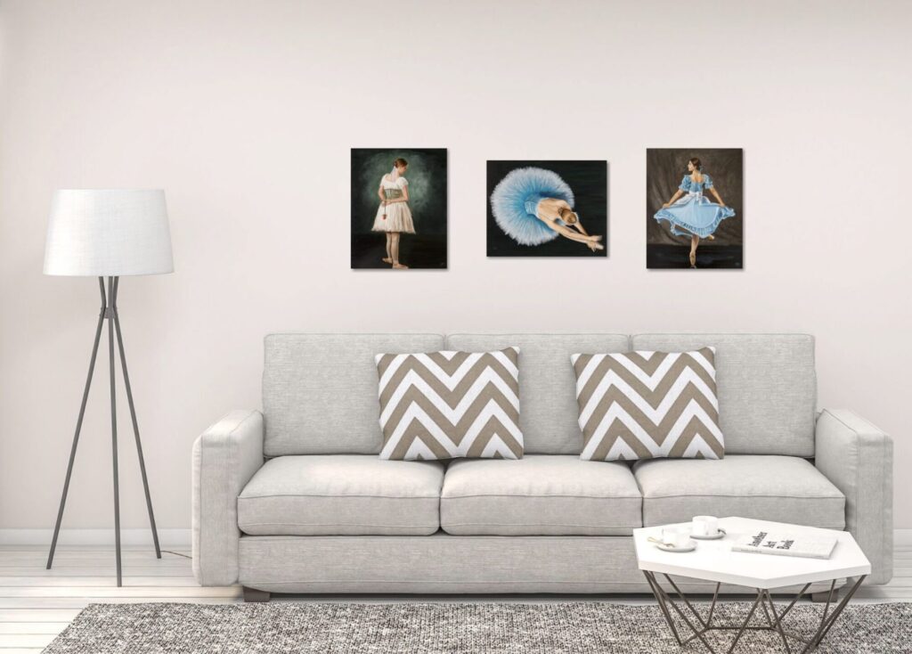 Collection of art above a sofa correctly sized